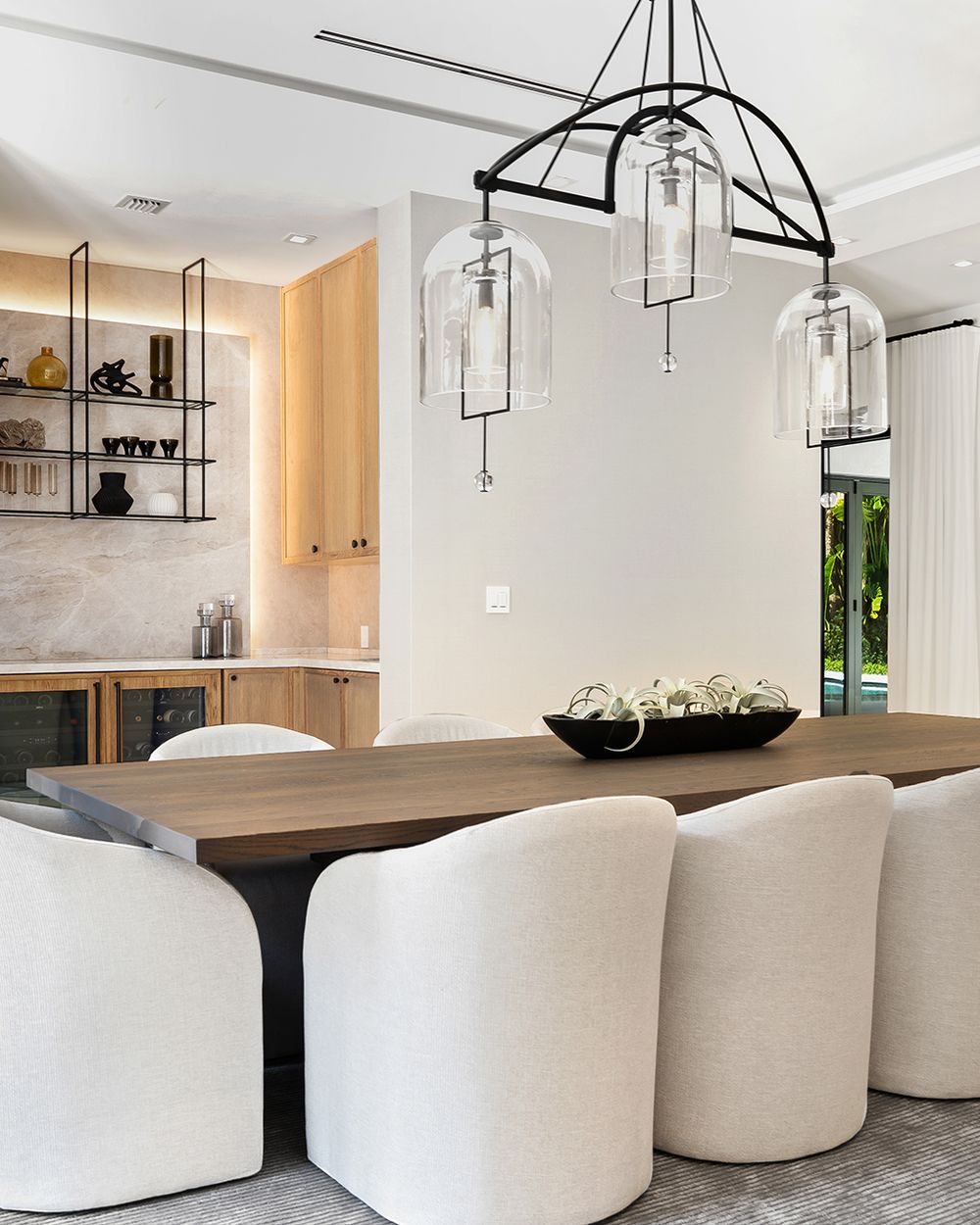 Dining room with wood table and linen chairs