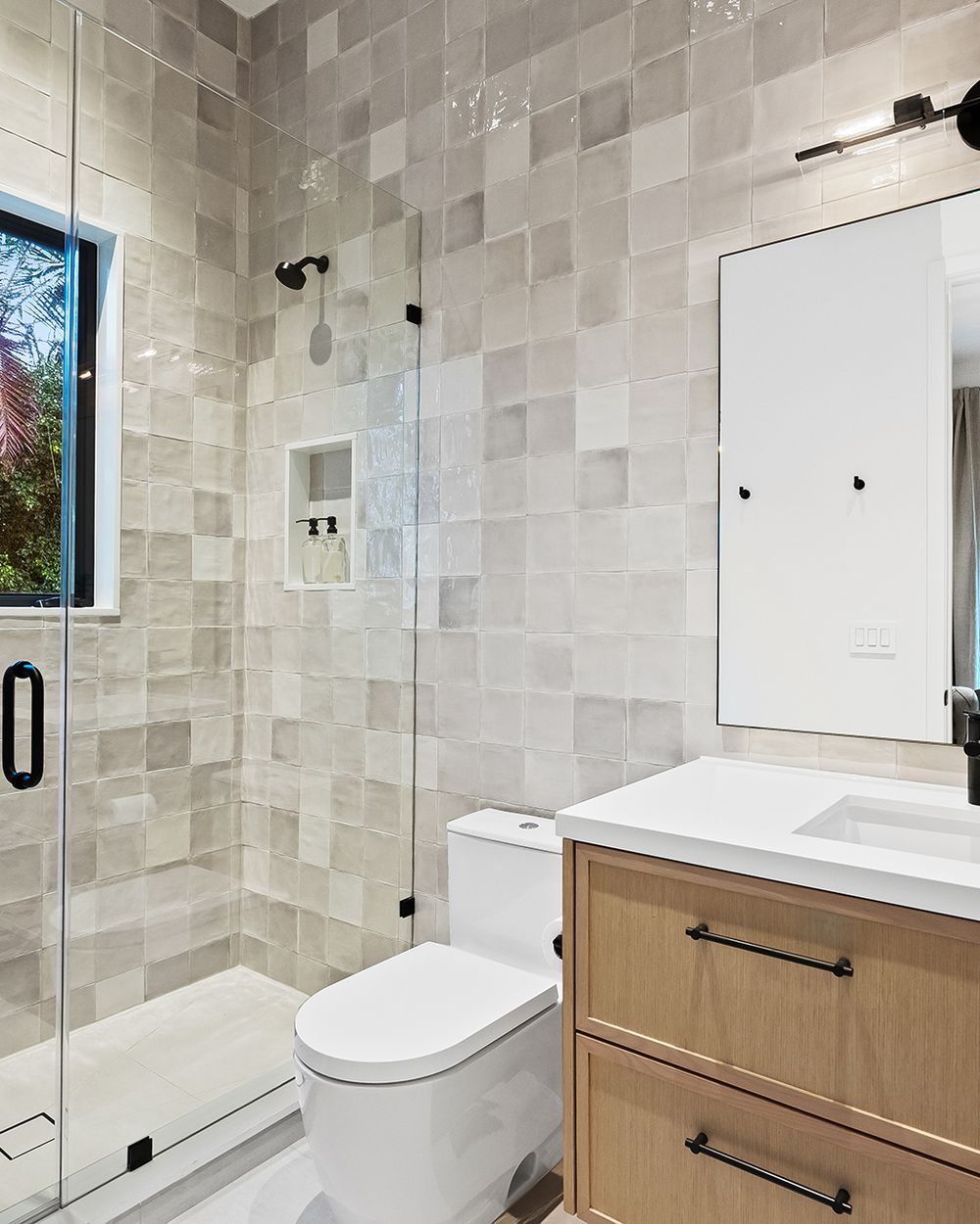 Guest bath with handmade-look tile and white-oak vanity
